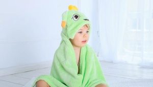  Asciugamano con cappuccio: caratteristiche di scelta e sartoria