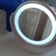 Magnifying mirror with light