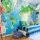  Wall mural with a world map in the interior of the nursery