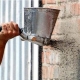  Paano mag-plaster ng isang brick wall?