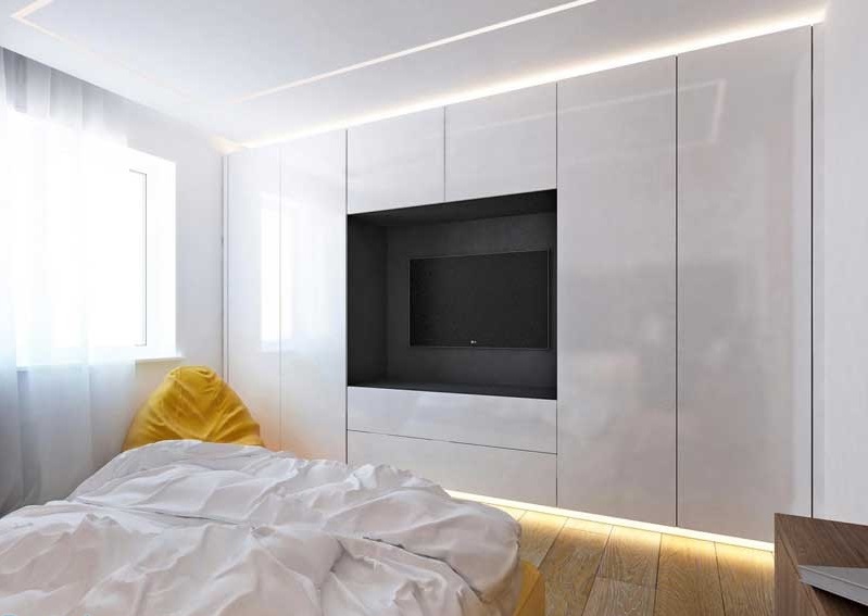 Gemaakt van Memoriseren Chronisch TV in de slaapkamer (45 foto's): de hoogte van de plaatsing van de tv aan  de muur, tips voor installatie en ontwerp, plaatsingsmogelijkheden